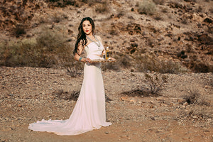 Meet founder of ALINE SCOTTSDALE Skincare, Adriana holding desert inspired skincare.